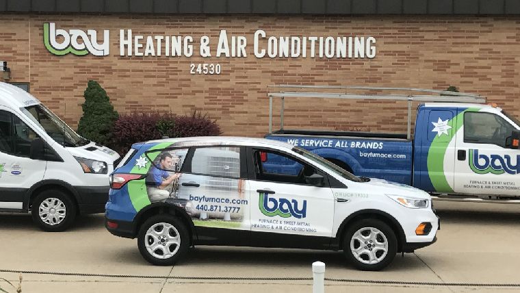 Bay Heating & Air Conditioning vans and trucks